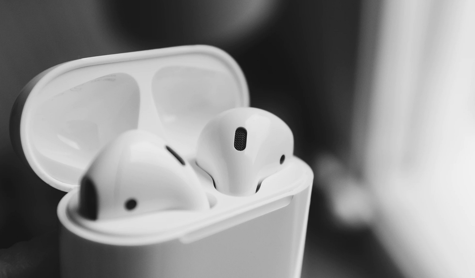 Uso compartido de audio con la carga inalámbrica de Apple Airpods
