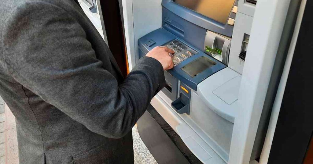 man withdrawing money from the atm
